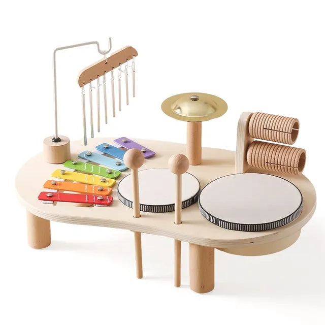 Children's musical activity table with colorful xylophone, drums, and bell. Ideal for toddlers & kids.