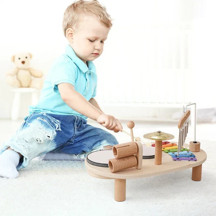 Educational toddler musical activity table. Promotes rhythm & fine motor skills with xylophone, drums, bell.