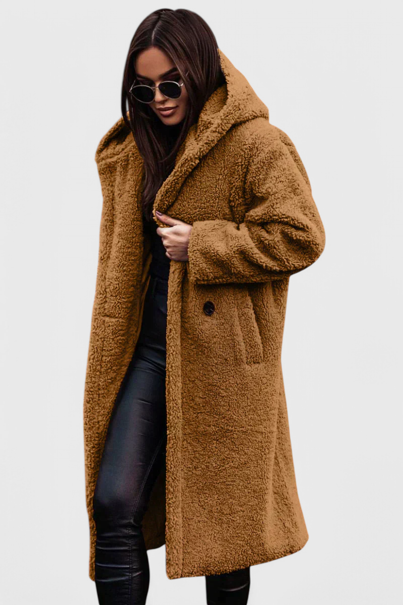 Women's oversized faux fur teddy long coat. Stylish, warm, and cozy winter outerwear.