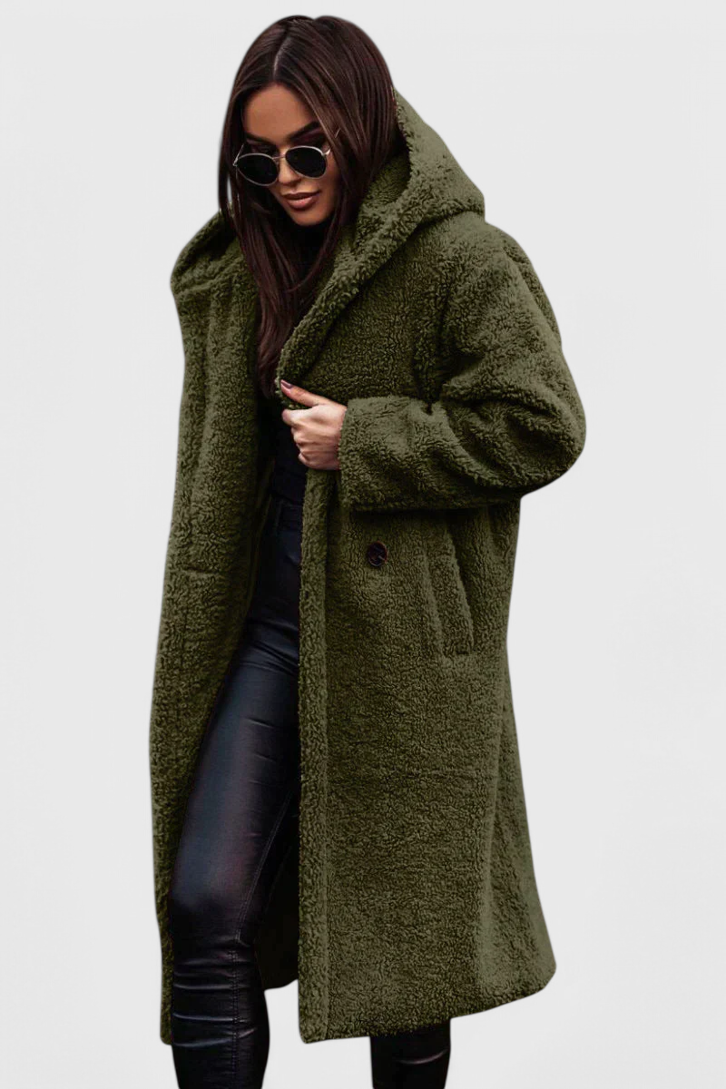 Warm women's oversized faux fur teddy long coat. Perfect stylish outerwear for winter fashion.