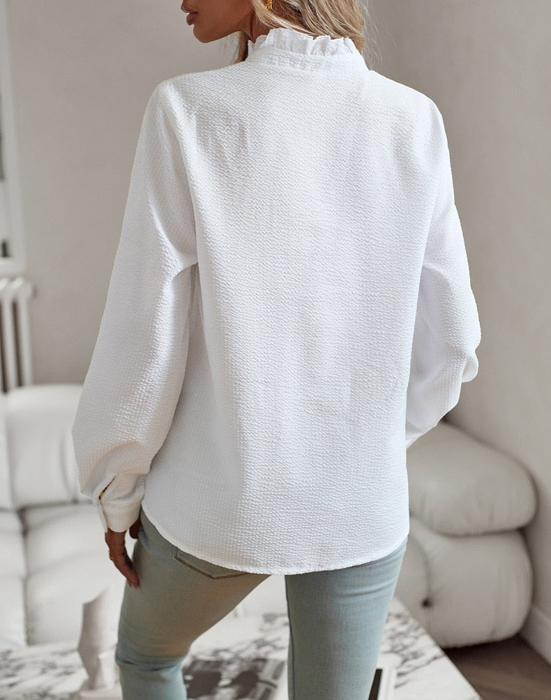 Chic women's top offering comfortable wear, ideal for casual chic or a statement look. Womens apparel.