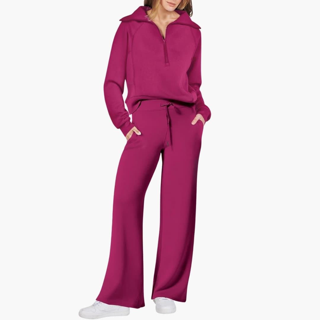 Green women's matching set: half-zip top & wide-leg drawstring pants. Comfortable casual loungewear.