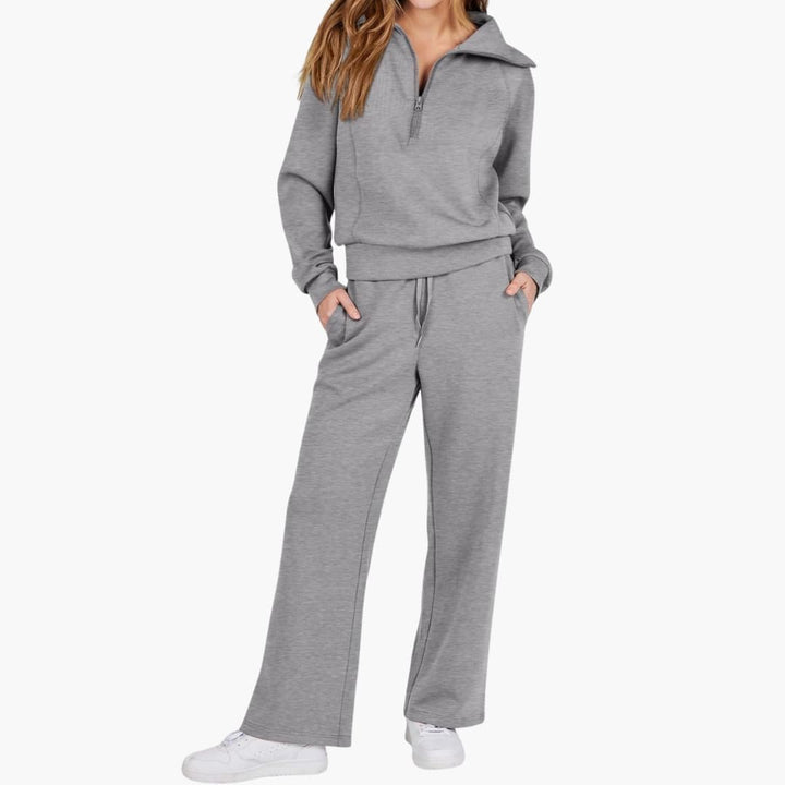 Women's cozy fashion two-piece set. Half-zip top & wide-leg pants. Stylish loungewear & travel outfit.