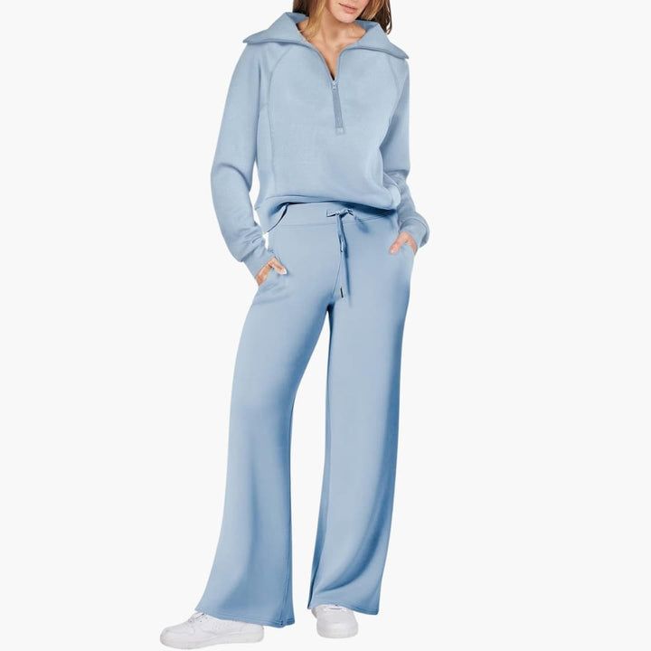 Women's comfortable half-zip top & wide-leg pants set. Elegant loungewear for relaxed fit & casual style.