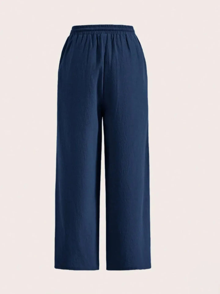 Comfortable women's fashion pants: wide leg cut with an adjustable drawstring for a stylish fit.