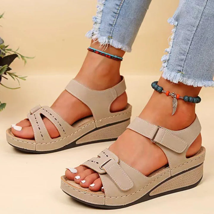 Stylish ladies' open toe orthopedic sandals, perfect for summer comfort & posture correction.