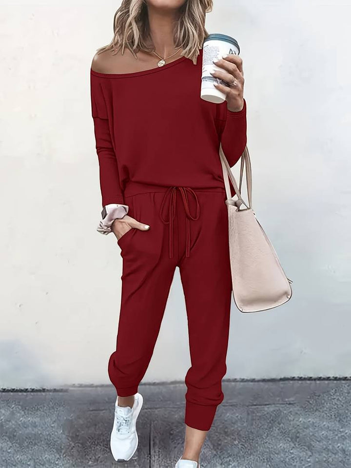 Effortless style with this women's two-piece top & trouser set. Comfortable, chic matching outfit for any occasion.