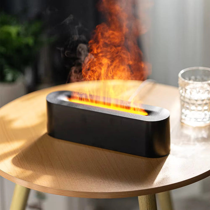 Stylish flame effect humidifier emitting soothing mist & warm LED glow for home or office ambiance.
