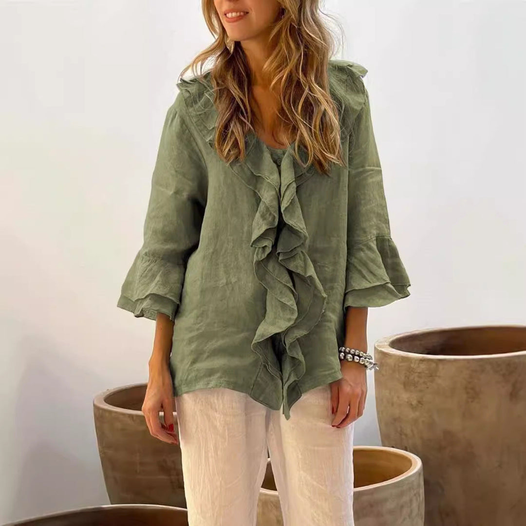 Relaxed fit women's 3/4 sleeve ruffled top, an elegant yet casual blouse for a versatile daily look.