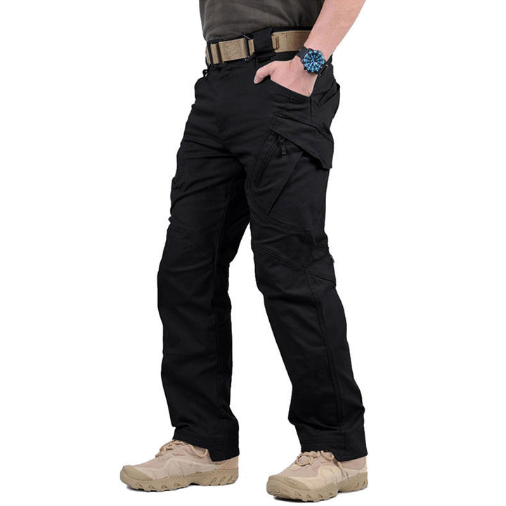 Rugged men's tactical workwear cargo trousers, durable for hiking and outdoor activities.