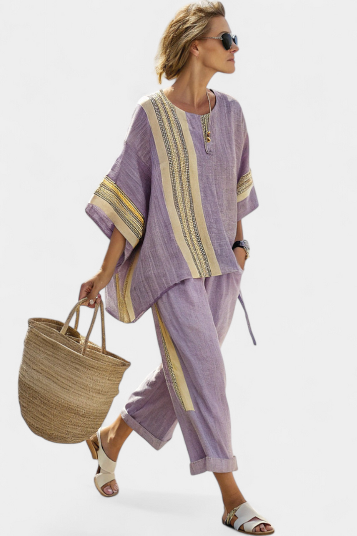 Elegant women's matching set: oversized top with contrast trim & flowing wide leg pants. Casual and stylish.