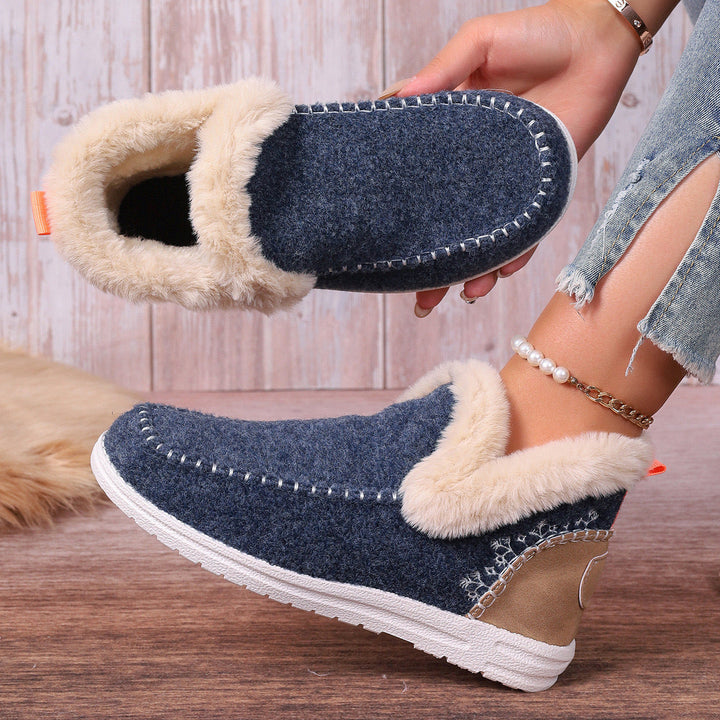 Top view of women's slip-on orthopedic house slippers. Cozy, warm indoor footwear with excellent support.