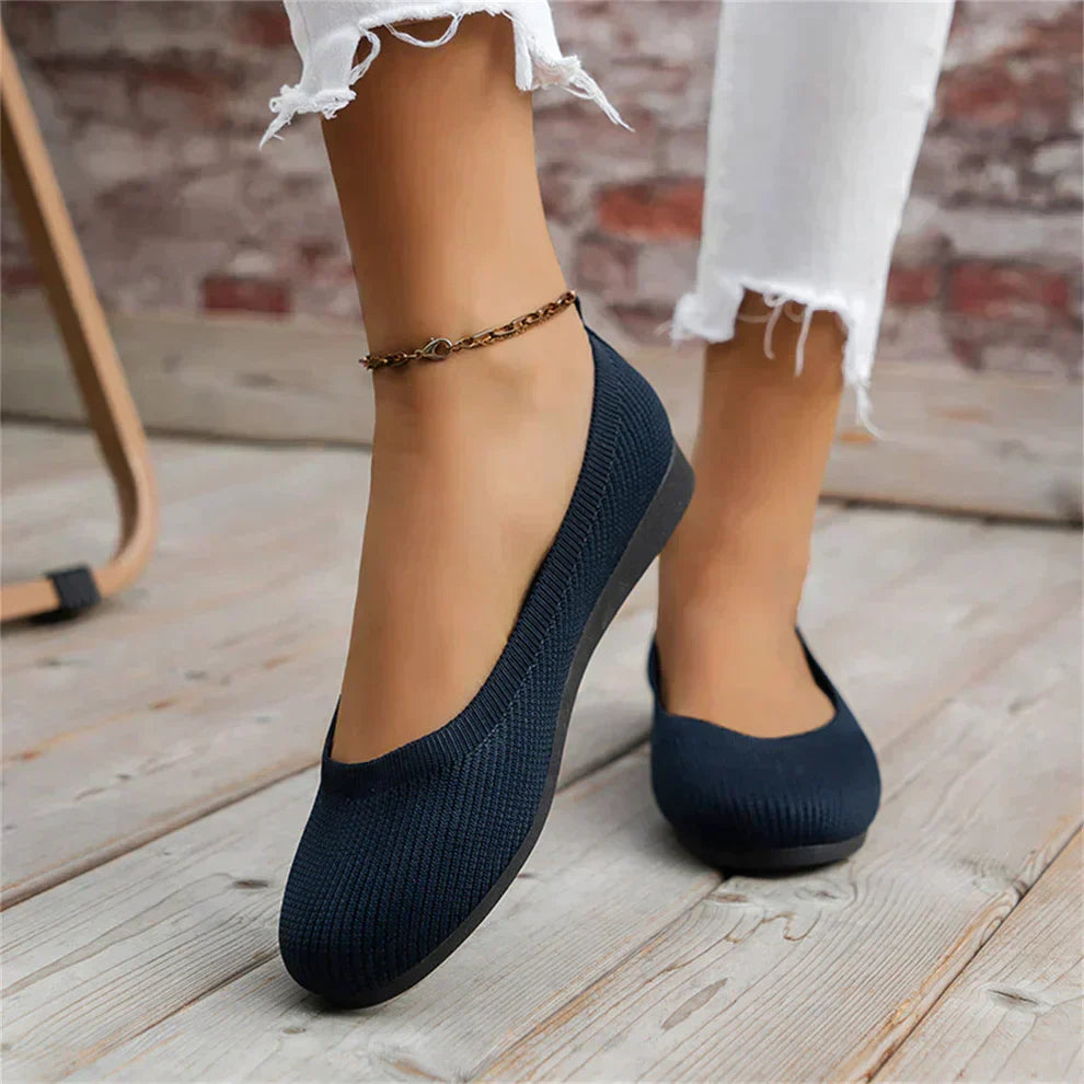 Chic women's slip-on ballet flats, offering supportive comfort for casual outings or work attire.