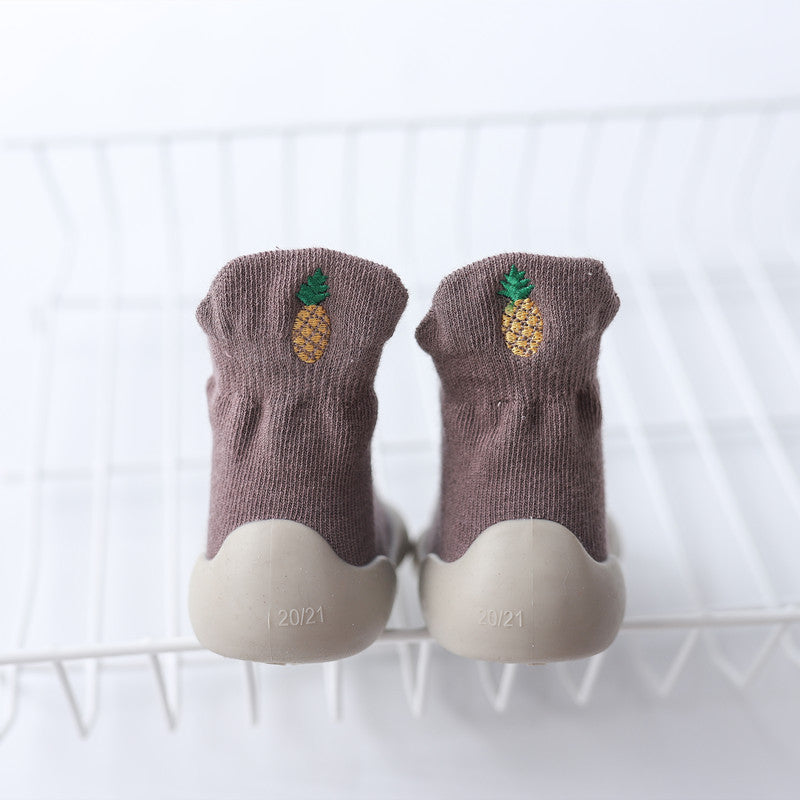 Toddler's flexible barefoot shoes promoting natural foot movement & healthy development for active kids.