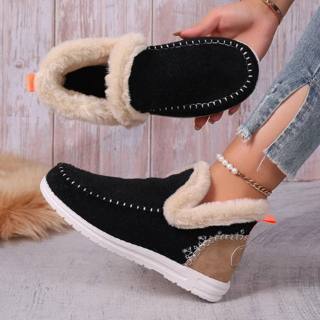 Warm women's orthopedic house slippers by a cozy fireplace. Supportive indoor footwear for ultimate comfort.