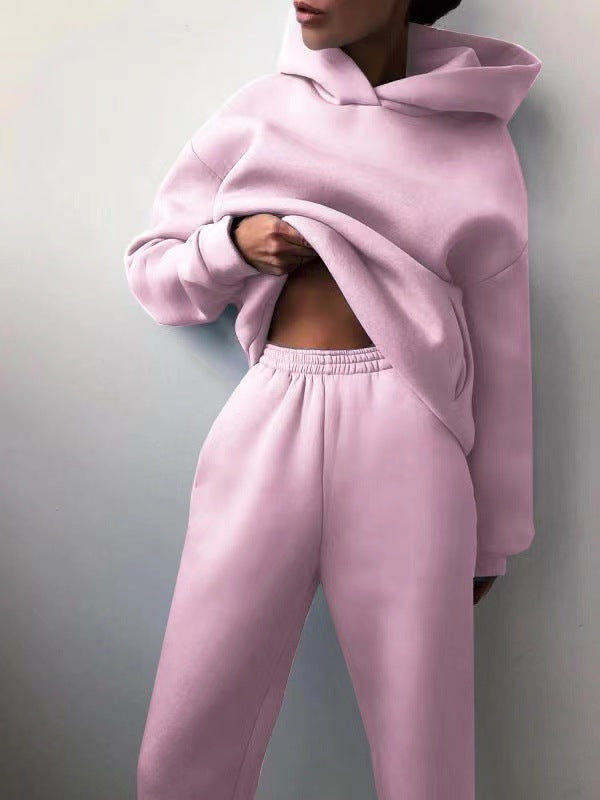 Leisurewear women's set with a comfy zip jacket and elastic waist joggers. Perfect for everyday casual style.