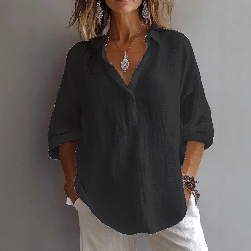 Elegant women's button placket top with wide sleeves & relaxed fit for everyday wear.