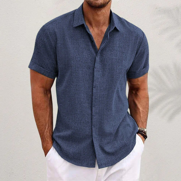 Comfortable men's classic collared short sleeve button-up shirt, ideal for warm summer days & everyday wear.