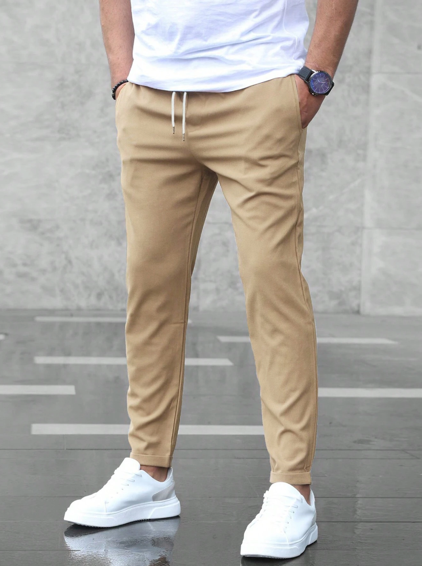 Close-up of soft men's fleece stretch pants, highlighting comfortable fabric and texture.