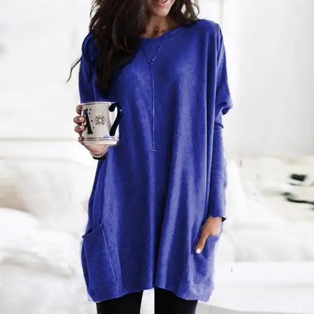 Plus size women's oversized pocket tunic, long sleeve, comfortable & relaxed fit for casual style.