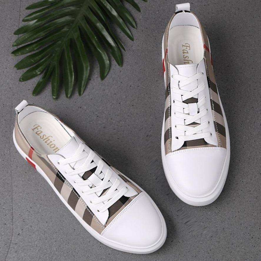 Stylish men's low top casual sneakers. Comfortable, lightweight footwear for everyday wear and modern fashion.