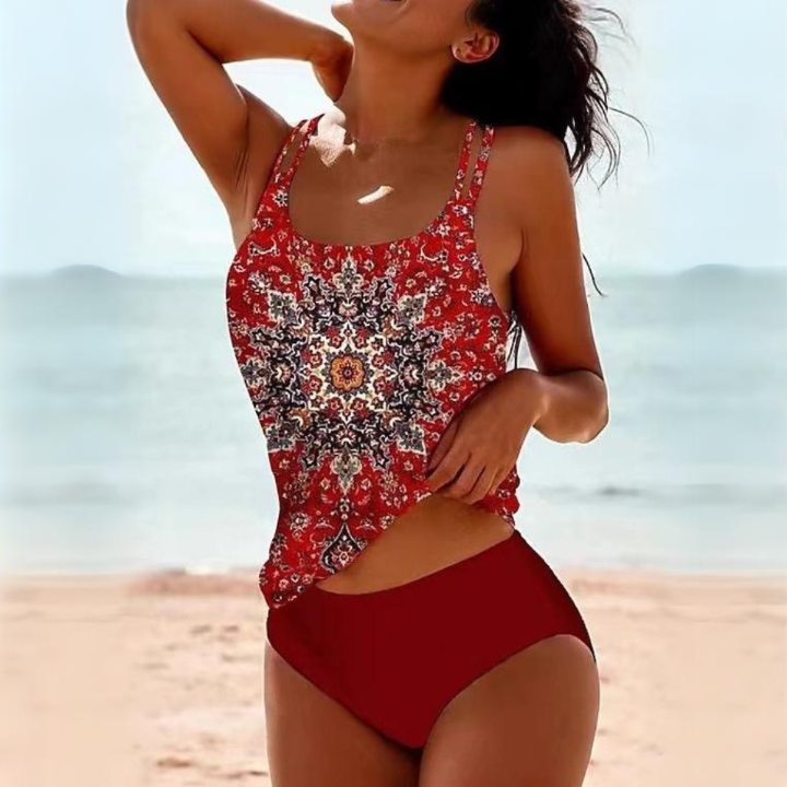 Sporty women's comfortable tankini swimsuit set with vibrant print top and matching boxer shorts, perfect for swimwear.