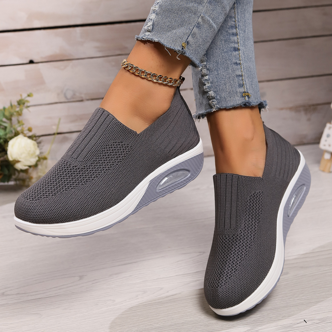 Modern women's orthopedic slip-on shoes, delivering cushioned arch support for daily comfort & style.