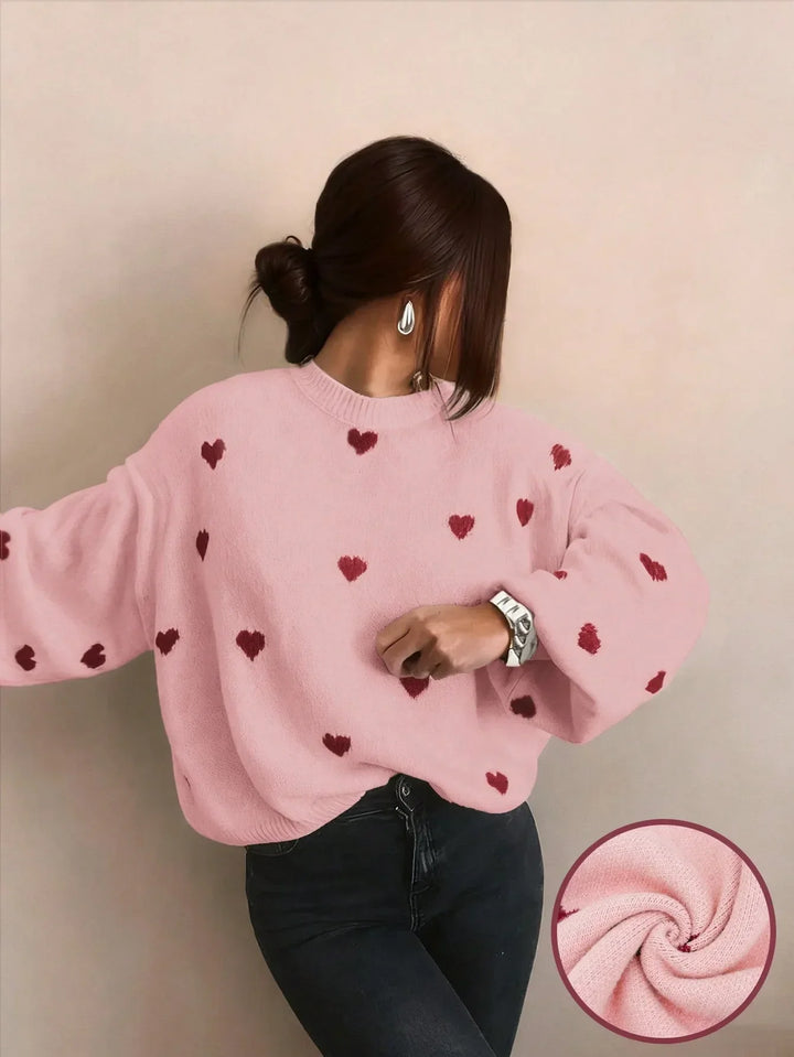 Casual women's oversized crew neck jumper with lovely heart embroidery, ideal for relaxed days.