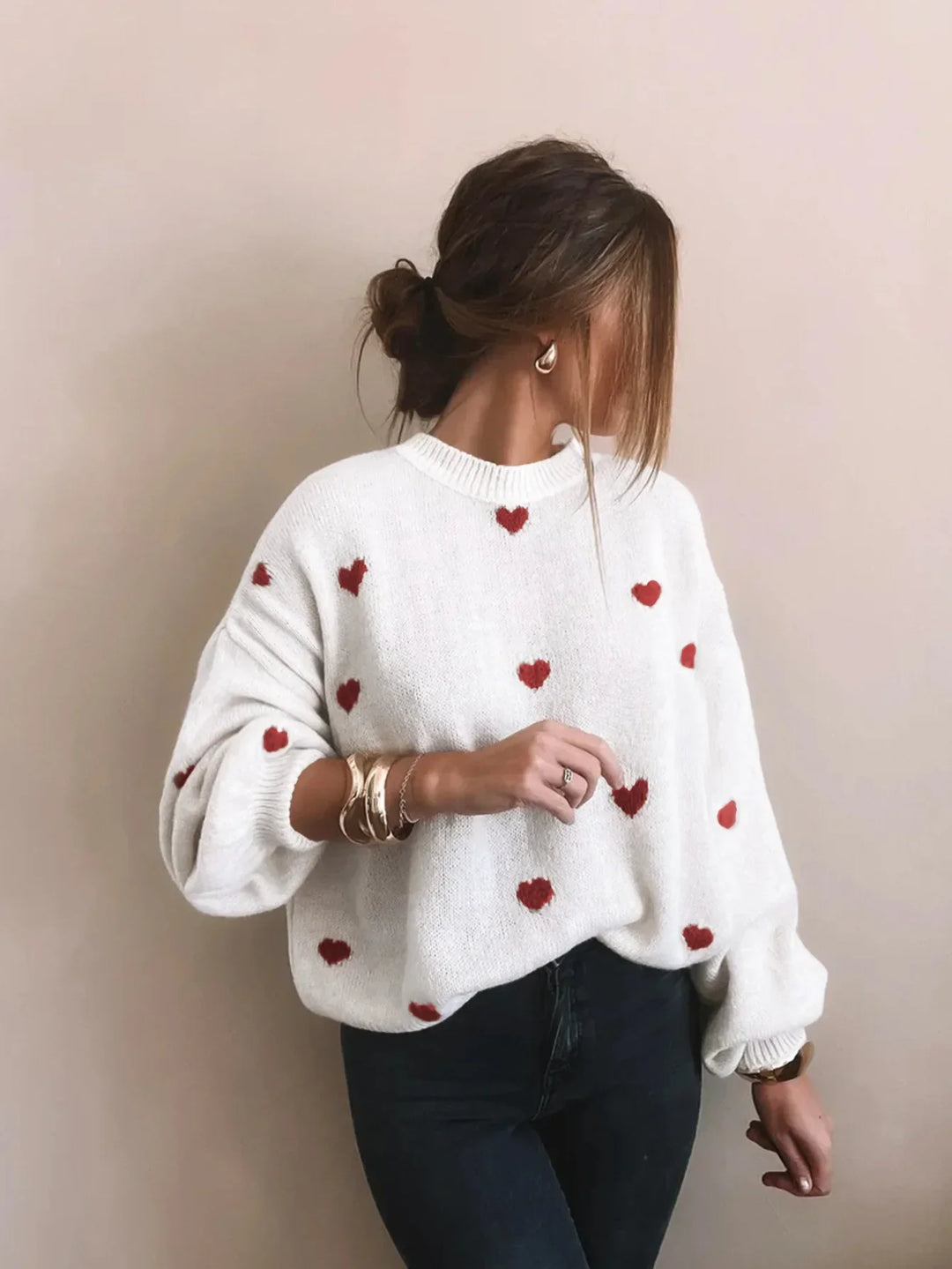 Stylish women's puff sleeve oversized jumper with delicate heart embroidery for cozy fall fashion.