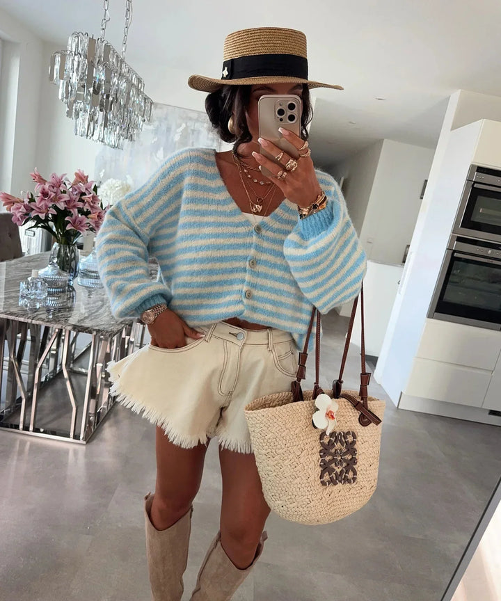 Comfortable oversized striped V-neck cardigan. A warm knit sweater for women, perfect for fall & winter.