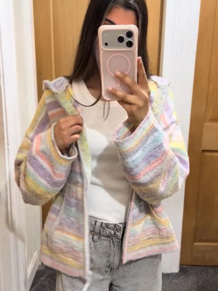 Soft oversized hooded women's jacket with pastel stripes.