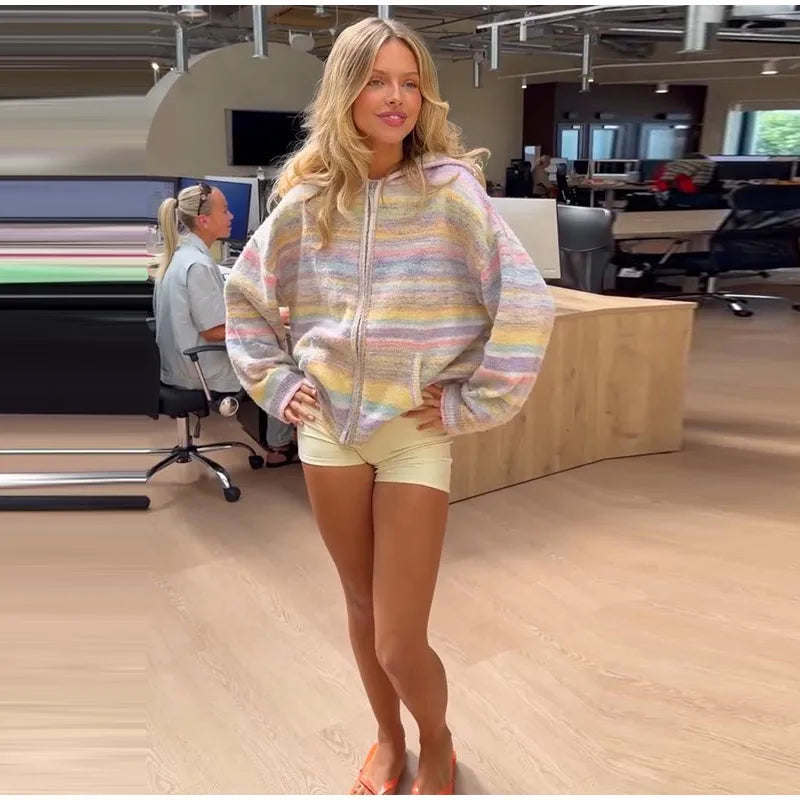 Stylish women's pastel striped zip-up for versatile casual looks.
