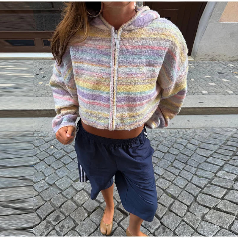 Cozy women's jacket featuring pastel stripes and a practical hood.
