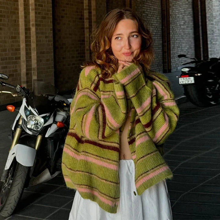 Cozy striped women's jacket with pastel colors and a hood.