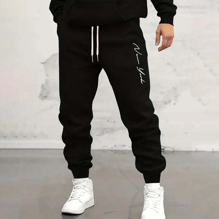 Men's comfortable drawstring jogger sweatpants for athletic wear, casual outings, or ultimate lounging comfort.