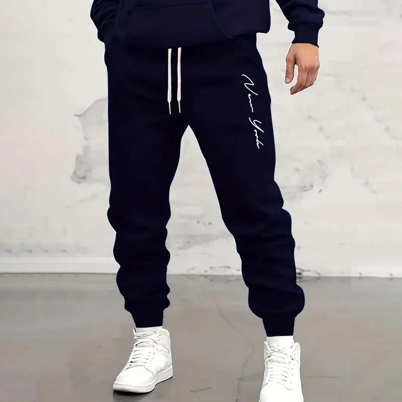 Soft men's comfort-fit jogger sweatpants with adjustable drawstring, perfect for active lifestyles & leisure.