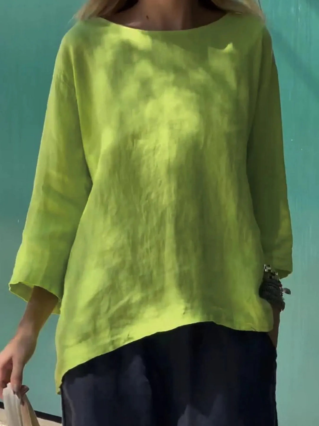 Women's plus size relaxed fit blouse with a round neck, perfect for casual spring & summer wear.