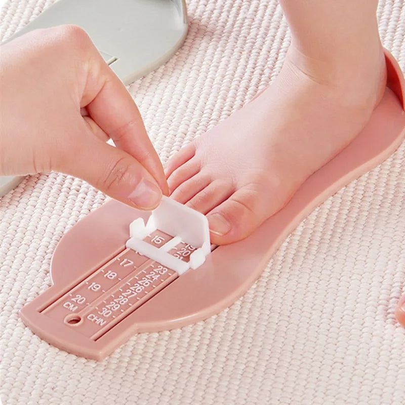 Kids' foot measuring device for accurate shoe sizing. Perfect for babies, toddlers & children. Ensures comfortable fit.