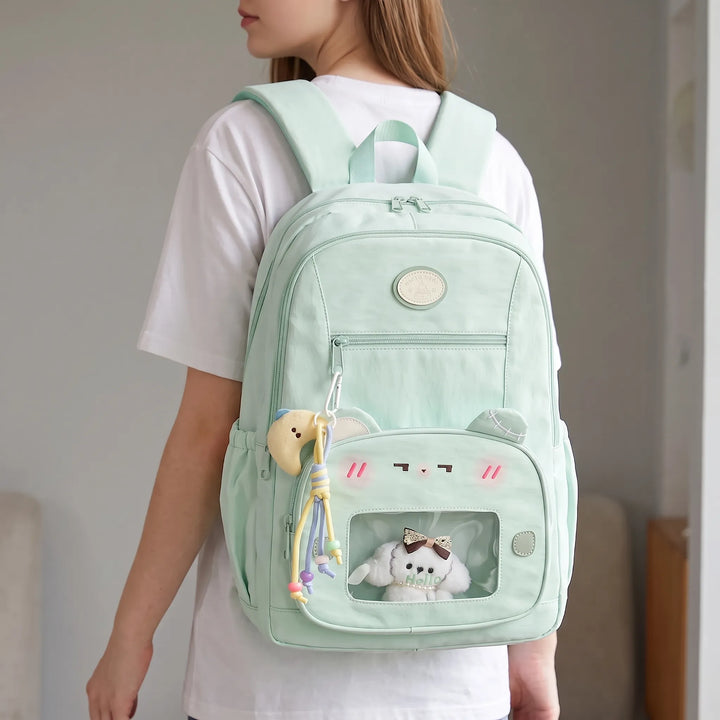 Unisex preppy school backpack with clear display window, ideal for students to customize and showcase pins.