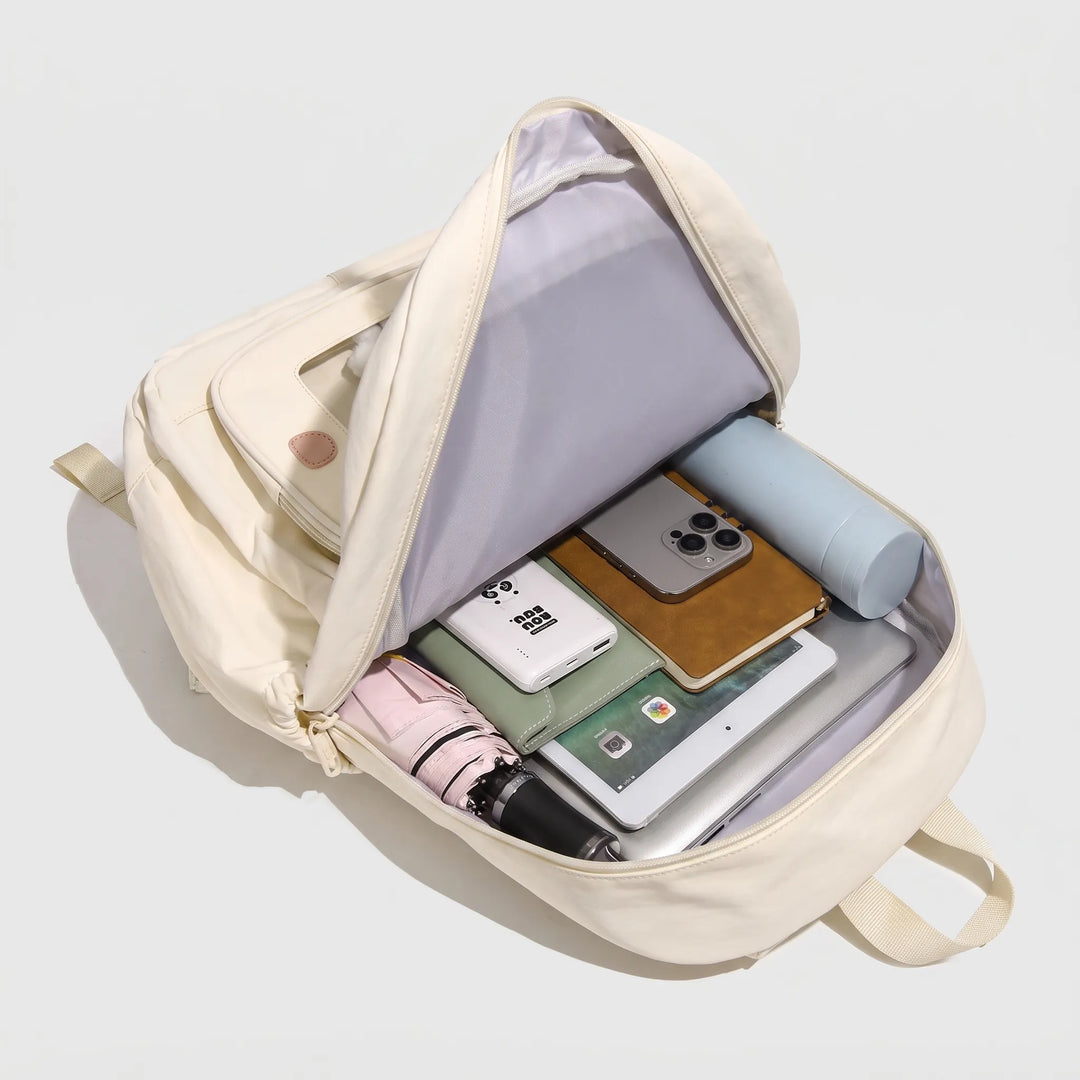 Stylish preppy unisex school daypack featuring a clear window for personalization, perfect for college students.