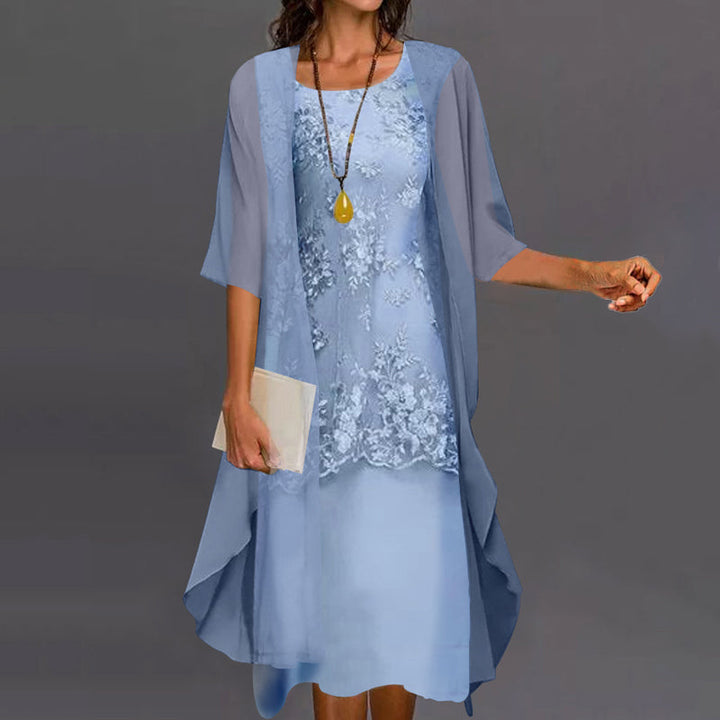 Elegant blue two-piece midi dress for women. Versatile party wear or stylish everyday fashion with a flattering fit.