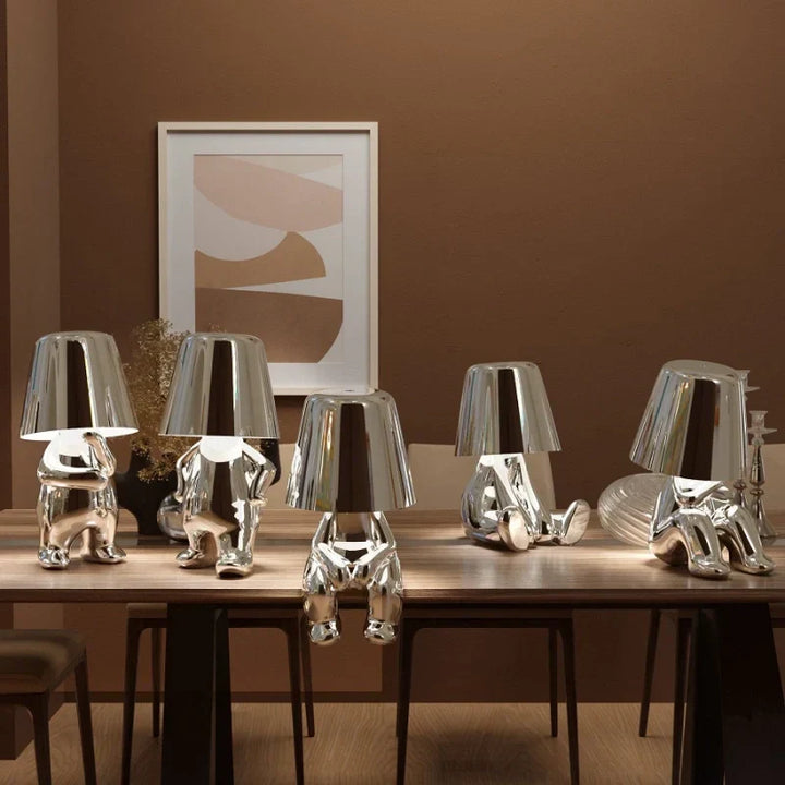 Portable cordless Nvroome LED figurine lamp, rechargeable with touch control for versatile mood lighting.