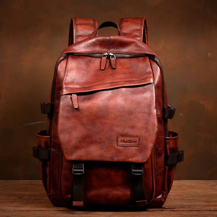 Functional unisex leather bag, handcrafted with ample space for laptop, school, or work essentials.