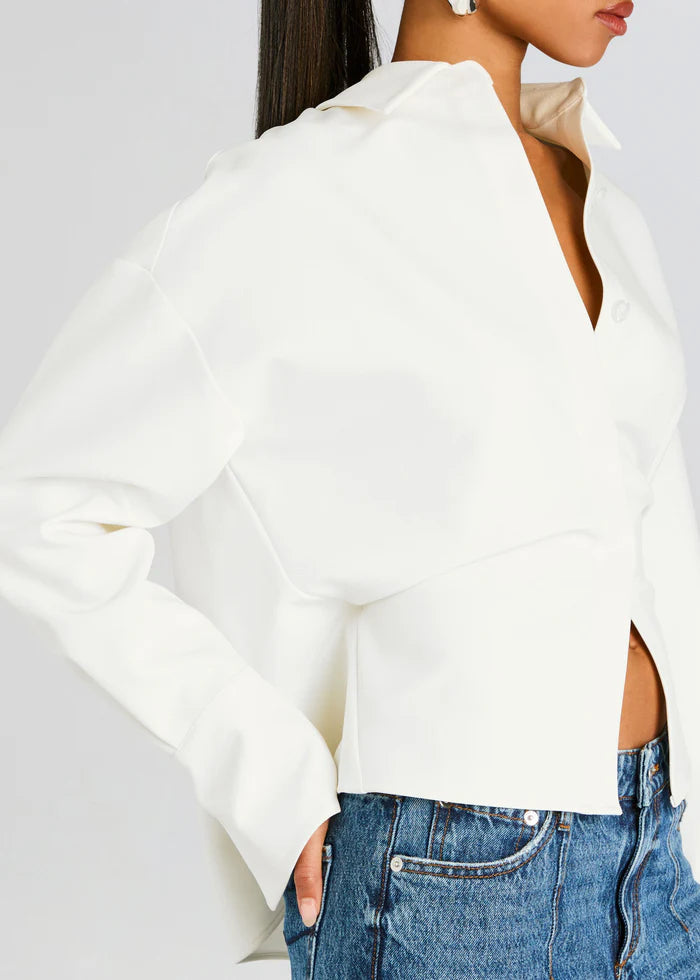 Women's versatile white long-sleeve button-down shirt. Elegant draped blouse for office wear & casual fashion.