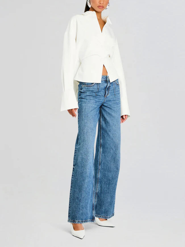 Stylish women's long-sleeve white draped button-down shirt, ideal for elegant office wear or smart casual outfits.