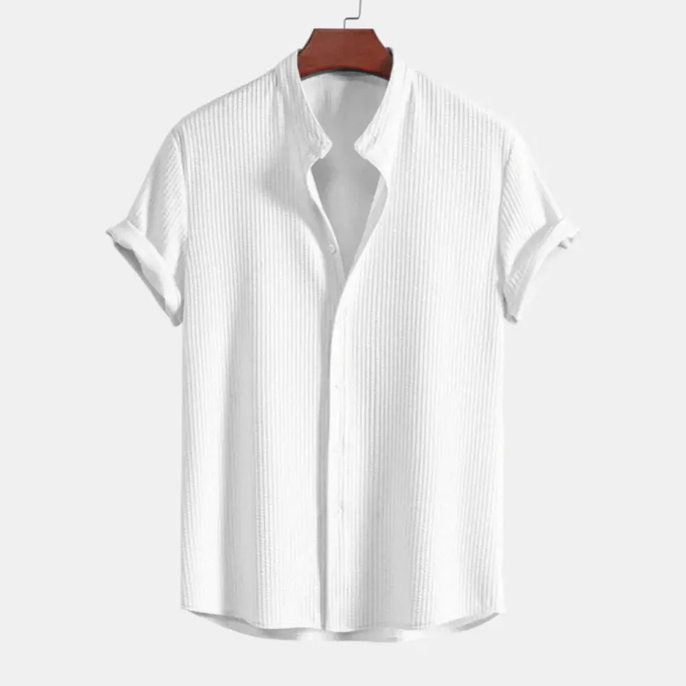 Stylish men's ribbed button-up shirt, tailored fit. An elegant long sleeve top for smart casual occasions.