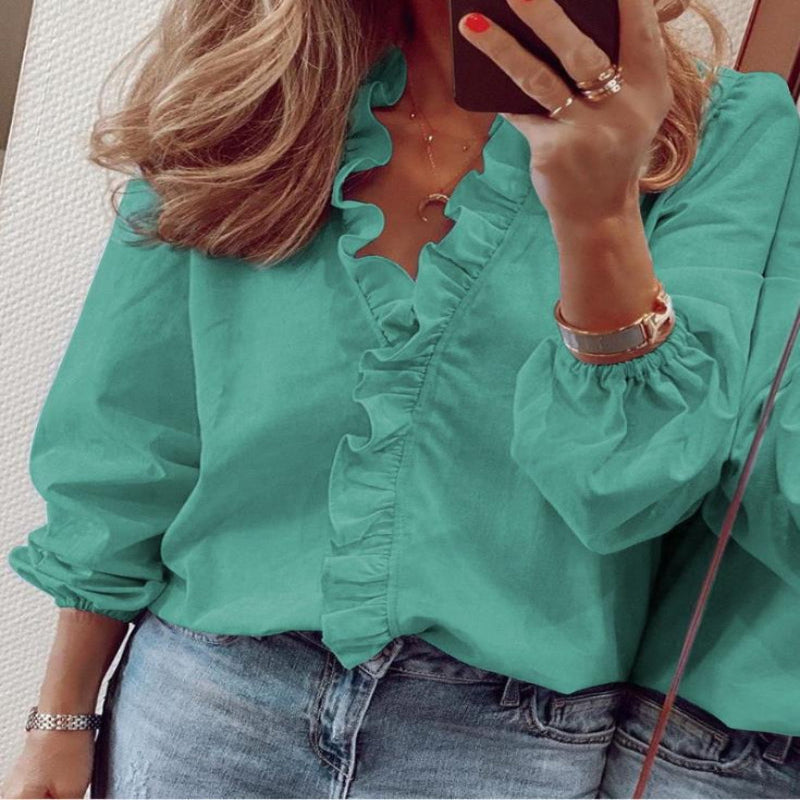 Stylish women's loose fit ruffle V-neck blouse, a versatile top for elegant casual wear or professional outfits.