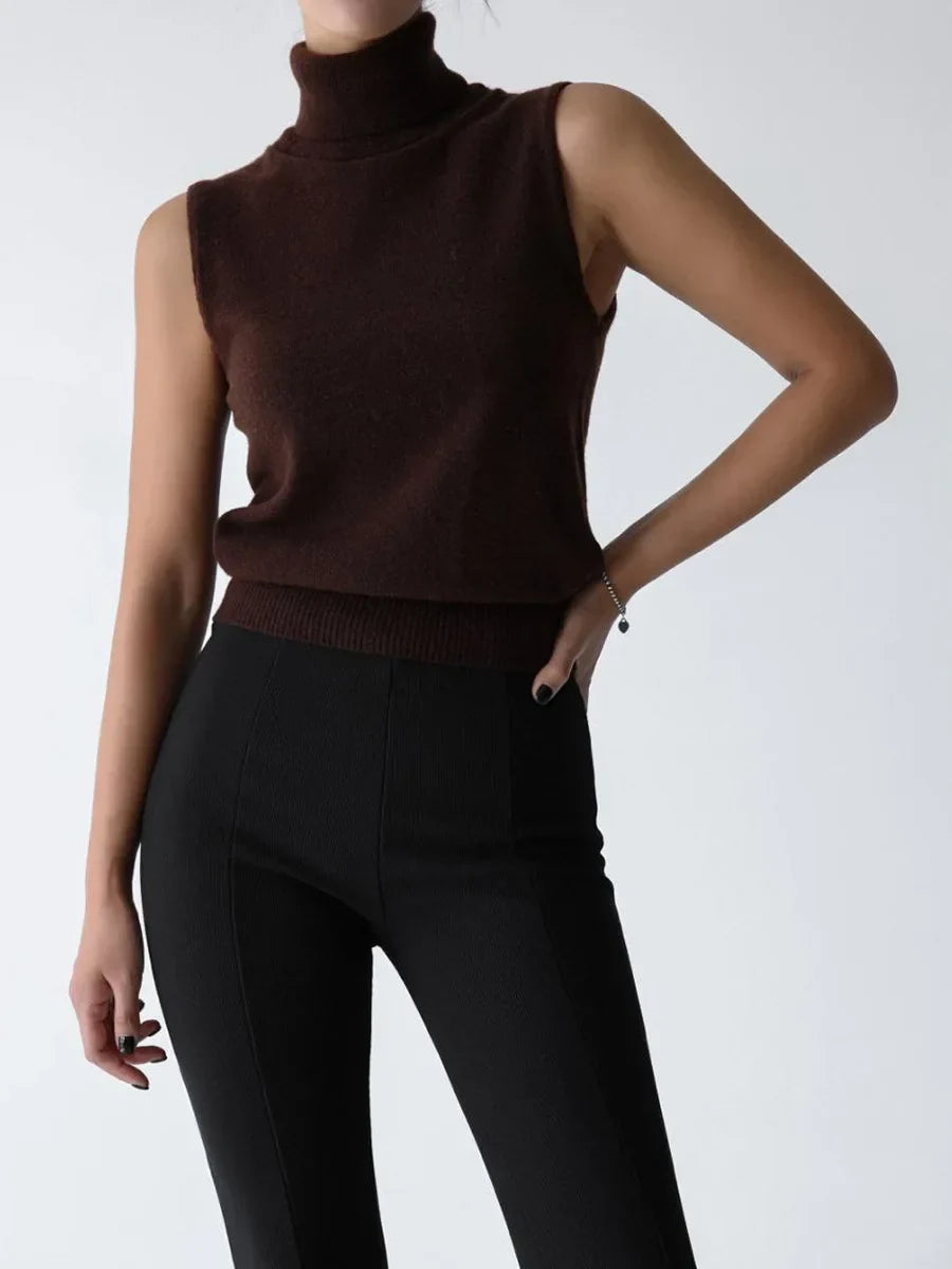 Women's chic turtleneck top, a versatile sleeveless piece for transitional weather.