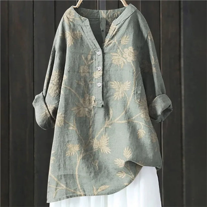 Chic women's floral print blouse, versatile for everyday elegant or casual fashion.
