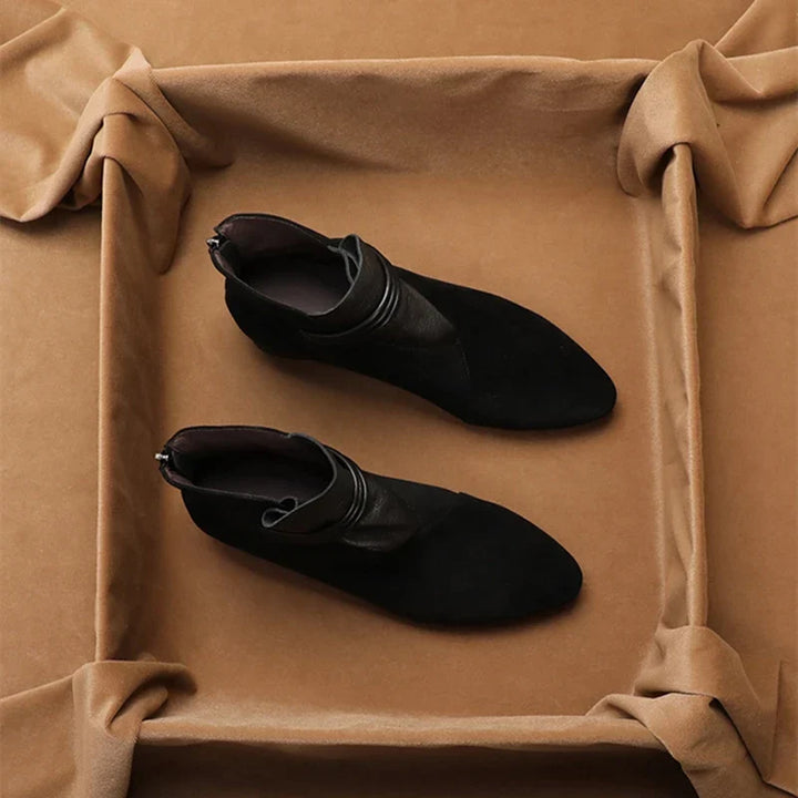 Grey comfortable women's ankle boots with a low heel, perfect for casual everyday style.